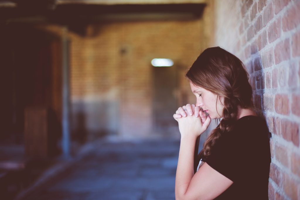 Prayer is the number 1 way to combat alcoholism. Photo by Ben White